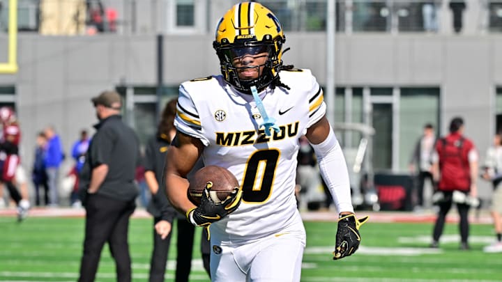Oct 12, 2024; Amherst, Massachusetts, USA; Missouri Tigers wide receiver Joshua Manning (0) warms up before a game against the Massachusetts Minutemen at Warren McGuirk Alumni Stadium. Mandatory Credit: Eric Canha-Imagn Images