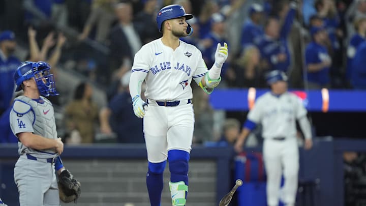 Nov 1, 2025; Toronto, Ontario, CAN; Toronto Blue Jays designated hitter Bo Bichette (11) reacts after hitting a three run home run against the Los Angeles Dodgers in the third inning during game seven of the 2025 MLB World Series at Rogers Centre. Mandatory Credit: John E. Sokolowski-Imagn Images Nov 1, 2025; Toronto, Ontario, CAN; Toronto Blue Jays designated hitter Bo Bichette (11) reacts after hitting a three run home run against the Los Angeles Dodgers in the third inning during game seven of the 2025 MLB World Series at Rogers Centre. Mandatory Credit: John E. Sokolowski-Imagn Images