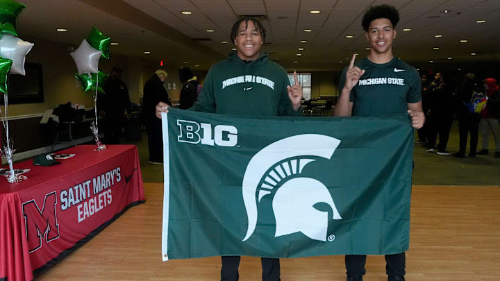 From left, Charles White and Jayden Savoury show off their pride after signing to play football with Michigan State University at Orchard Lake St. Mary’s Preparatory in Orchard Lake on Wednesday, Dec. 4, 2024. From left, Charles White and Jayden Savoury show off their pride after signing to play football with Michigan State University at Orchard Lake St. Mary’s Preparatory in Orchard Lake on Wednesday, Dec. 4, 2024.