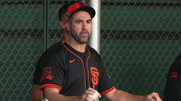 Feb 13, 2025; Scottsdale, AZ, USA; San Francisco Giants pitcher Justin Verlander (35) watches players work out in the bullpen during spring training camp. Feb 13, 2025; Scottsdale, AZ, USA; San Francisco Giants pitcher Justin Verlander (35) watches players work out in the bullpen during spring training camp.