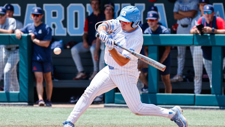 Jun 8, 2025; Chapel Hill, NC, USA;  North Carolina outfielder Rom Kellis (25) hits the ball during the seventh inning of the Super Regionals game against Arizona in Chapel Hill, North Carolina. Mandatory Credit: Jaylynn Nash-Imagn Images