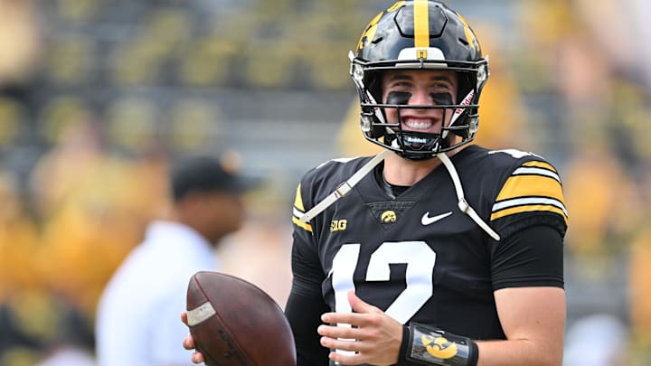 Sep 16, 2023; Iowa City, Iowa, USA; Iowa Hawkeyes quarterback Cade McNamara (12) looks on before the game against the Western Michigan Broncos at Kinnick Stadium. Mandatory Credit: Jeffrey Becker-USA TODAY Sports