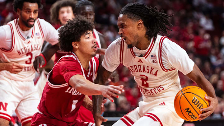 Nebraska guard Ahron Ulis (2) drives against Indiana guard Myles Rice (1) during the first half at Pinnacle Bank Arena. 