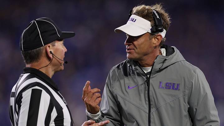 Oct 10, 2026; Lexington, Kentucky, USA;  LSU Tigers head coach Lane Kiffin speaks with a referee during the second quarter against the Kentucky Wildcats at Kroger Field.  Mandatory Credit: Jordan Prather-Imagn Images