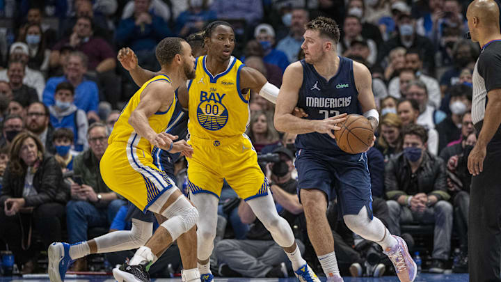 Jan 5, 2022; Dallas, Texas, USA; Golden State Warriors guard Stephen Curry (30) and forward Jonathan