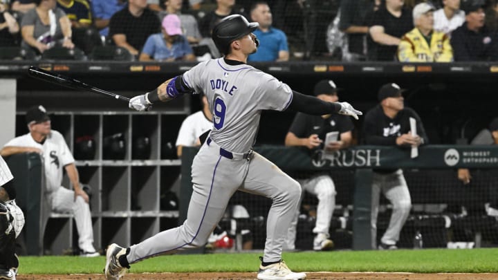 Jun 27, 2024; Chicago, Illinois, USA;  Colorado Rockies outfielder Brenton Doyle (9) hits a two-run home run against the Chicago White Sox during the sixth inning at Guaranteed Rate Field.