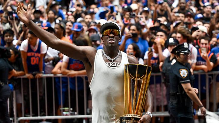 Jun 18, 2026; New York, NY, USA; New York Knicks forward Trey Jemison III walks towards New York Knicks fans with the NBA Cup Trophy during the New York Knicks Championship Parade through the Canyon of Heroes. Mandatory Credit: Brenden Willsch-Imagn Images