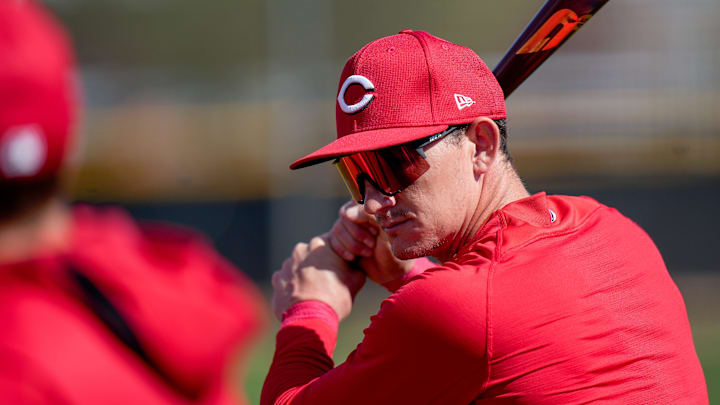Cincinnati Reds outfielder Austin Hays (12) practices his swing as he waits his turn to bat during spring training, Thursday, Feb. 20, 2025, at the Cincinnati Reds Player Development Complex in Goodyear, Ariz.
