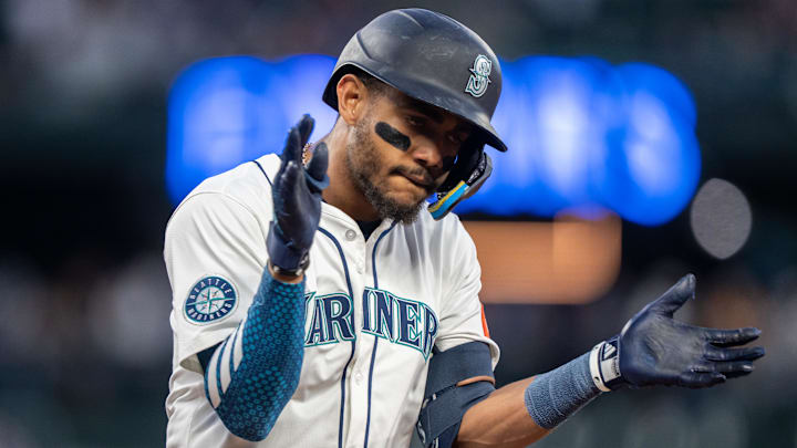 Seattle Mariners outfielder Julio Rodriguez celebrates after getting a hit against the Washington Nationals on May 27 at T-Mobile Park.