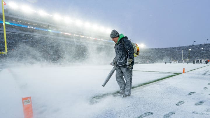 Nov 19, 2022; South Bend, Indiana, USA; Grounds crews clear snow off the field boundary lines in the fourth quarter of the game between the Notre Dame Fighting Irish and the Boston College Eagles at Notre Dame Stadium. Nov 19, 2022; South Bend, Indiana, USA; Grounds crews clear snow off the field boundary lines in the fourth quarter of the game between the Notre Dame Fighting Irish and the Boston College Eagles at Notre Dame Stadium.