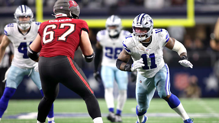 Dallas Cowboys linebacker Micah Parsons rushes the passer against Tampa Bay Buccaneers offensive tackle Luke Goedeke.