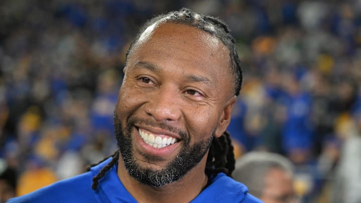 Oct 24, 2024; Pittsburgh, Pennsylvania, USA; Former Pittsburgh Panthers wide receiver Larry Fitzgerald reacts on the sideline against the Syracuse Orange during the second half at Acrisure Stadium. Mandatory Credit: Barry Reeger-Imagn Images Oct 24, 2024; Pittsburgh, Pennsylvania, USA; Former Pittsburgh Panthers wide receiver Larry Fitzgerald reacts on the sideline against the Syracuse Orange during the second half at Acrisure Stadium. Mandatory Credit: Barry Reeger-Imagn Images