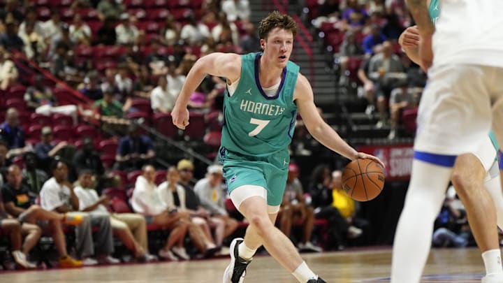 Jul 14, 2025; Las Vegas, NV, USA; Charlotte Hornets guard Kon Knueppel (7) dribbles the ball against the Dallas Mavericks during the second half of a NBA basketball game at the Thomas & Mack Center. Mandatory Credit: Lucas Peltier-Imagn Images