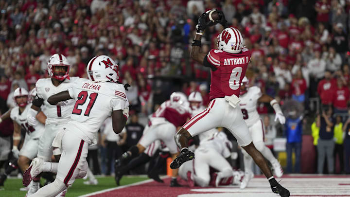 Aug 28, 2025; Madison, Wisconsin, USA;  Wisconsin Badgers wide receiver Vinny Anthony II (8) catches a pass to score a touchdown during the third quarter against the Miami (OH) RedHawks at Camp Randall Stadium. Mandatory Credit: Jeff Hanisch-Imagn Images