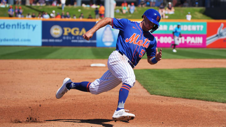 Feb 27, 2024; Port St. Lucie, Florida, USA;  New York Mets second baseman Rylan Bannon (58) rounds third base and scores a run in the third inning against the Miami Marlins at Clover Park. Mandatory Credit: Jim Rassol-USA TODAY Sports