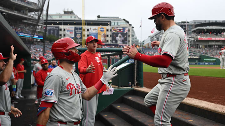 Sep 29, 2024; Washington, District of Columbia, USA; Philadelphia Phillies designated hitter Kyle Schwarber celebrates with first baseman Kody Clemens. Sep 29, 2024; Washington, District of Columbia, USA; Philadelphia Phillies designated hitter Kyle Schwarber celebrates with first baseman Kody Clemens.