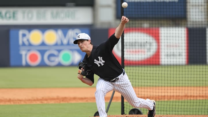 Feb 20, 2025; Tampa, FL, USA; New York Yankees pitcher Max Fried (54) throws the ball during work outs at George M. Steinbrenner Field. 