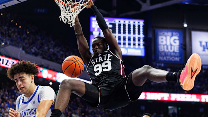 Mississippi State Bulldogs forward Achor Achor (99) dunks the ball during the first half against the Kentucky Wildcats at Rupp Arena at Central Bank Center.