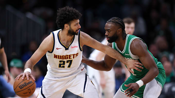 Mar 2, 2025; Boston, Massachusetts, USA; Denver Nuggets guard Jamal Murray (27) defended by Boston Celtics forward Jaylen Brown (7) during the second half at TD Garden. Mandatory Credit: Paul Rutherford-Imagn Images Mar 2, 2025; Boston, Massachusetts, USA; Denver Nuggets guard Jamal Murray (27) defended by Boston Celtics forward Jaylen Brown (7) during the second half at TD Garden. Mandatory Credit: Paul Rutherford-Imagn Images