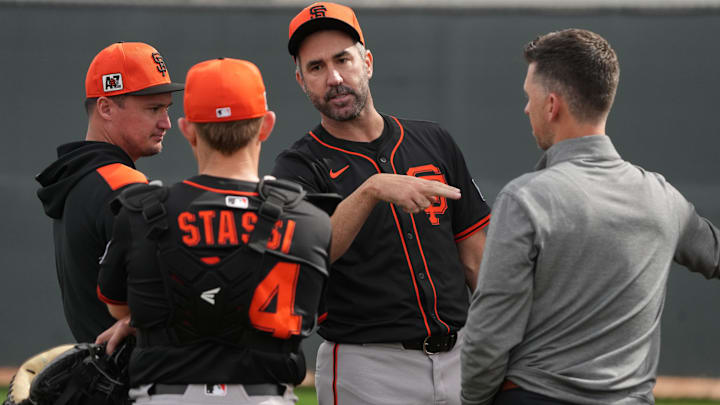 Feb 13, 2025; Scottsdale, AZ, USA; San Francisco Giants pitcher Justin Verlander (35) watches players work out in the bullpen during spring training camp. Feb 13, 2025; Scottsdale, AZ, USA; San Francisco Giants pitcher Justin Verlander (35) watches players work out in the bullpen during spring training camp.