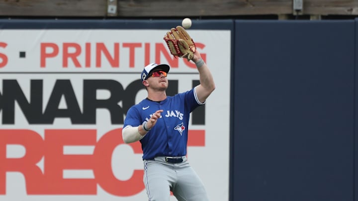 Toronto Blue Jays outfielder Alan Roden (83) catches a fly ball during the second inning against the Tampa Bay Rays at Charlotte Sports Park on March 9.
