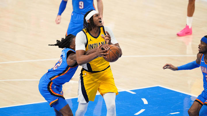 Jun 22, 2025; Oklahoma City, Oklahoma, USA; Indiana Pacers center Myles Turner (33) looks to shoot while Oklahoma City Thunder guard Cason Wallace (22) defends during the first half of game seven of the 2025 NBA Finals at Paycom Center. Mandatory Credit: Kyle Terada-Imagn Images Jun 22, 2025; Oklahoma City, Oklahoma, USA; Indiana Pacers center Myles Turner (33) looks to shoot while Oklahoma City Thunder guard Cason Wallace (22) defends during the first half of game seven of the 2025 NBA Finals at Paycom Center. Mandatory Credit: Kyle Terada-Imagn Images