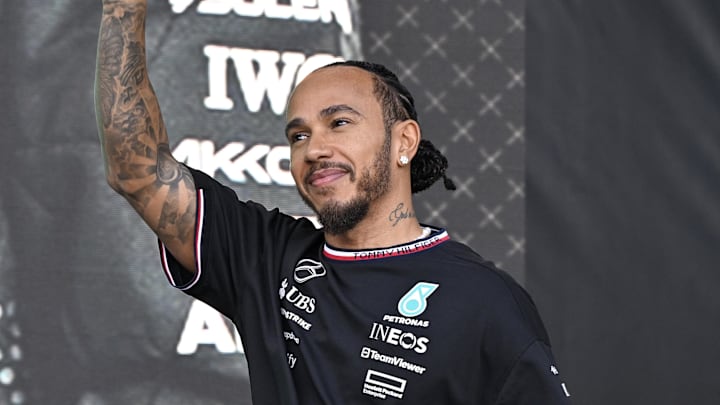 Oct 19, 2024; Austin, Texas, USA; Mercedes AMG Petronas F1 Team driver Lewis Hamilton (44) of Team Great Britain waves to the crowd during a fan forum before the Sprint Race in the 2024 Formula One US Grand Prix at Circuit of the Americas. Mandatory Credit: Jerome Miron-Imagn Images