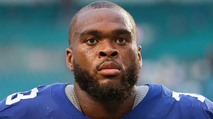 Aug 22, 2026; Miami Gardens, Florida, USA; New York Giants offensive tackle Evan Neal (73) looks on after the game against the Miami Dolphins at Hard Rock Stadium. Mandatory Credit: Sam Navarro-Imagn Images