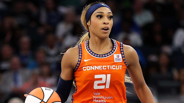 Connecticut Sun guard DiJonai Carrington (21) dribbles during the first half against the Minnesota Lynx.