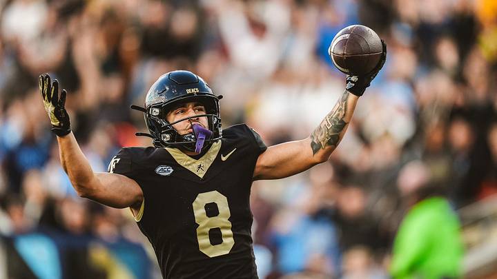 Nov 15, 2025; Winston-Salem, North Carolina, USA; Wake Forest Demon Deacons wide receiver Carlos Hernandez (8) reacts after a play against the North Carolina Tar Heels at Allegacy Federal Credit Union Stadium. Mandatory Credit: Wake Forest Athletics via Imagn Images