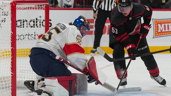 Sep 29, 2026; Raleigh, North Carolina, USA; Florida Panthers goaltender Jacob Markstrom (25) and Carolina Hurricanes right wing Jackson Blake (53) watch a puck go wide of the net during the third period at Lenovo Center. Mandatory Credit: James Guillory-Imagn Images Sep 29, 2026; Raleigh, North Carolina, USA; Florida Panthers goaltender Jacob Markstrom (25) and Carolina Hurricanes right wing Jackson Blake (53) watch a puck go wide of the net during the third period at Lenovo Center. Mandatory Credit: James Guillory-Imagn Images