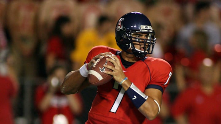 Sept 2, 2006; Tucson, AZ, USA; Arizona Wildcats quarterback (7) Willie Tuitama looks to throw against the Brigham Young Cougars during the second quarter at Arizona Stadium. Mandatory Credit: Rick Scuteri-US Presswire Copyright Rick Scuteri Sept 2, 2006; Tucson, AZ, USA; Arizona Wildcats quarterback (7) Willie Tuitama looks to throw against the Brigham Young Cougars during the second quarter at Arizona Stadium. Mandatory Credit: Rick Scuteri-US Presswire Copyright Rick Scuteri