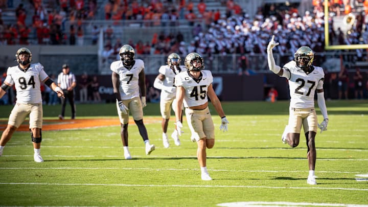 Wake Forest's defense, headlined by safety Nick Andersen (45), celebrates against the Virginia Tech Hokies, Oct. 4, 2025.