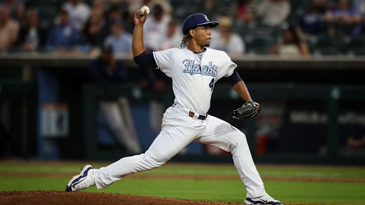 Hooks pitcher Miguel Ullola throws a pitch on Opening Night at Whataburger Field on Friday, April 5, 2024, in Corpus Christi, Texas. Hooks pitcher Miguel Ullola throws a pitch on Opening Night at Whataburger Field on Friday, April 5, 2024, in Corpus Christi, Texas.