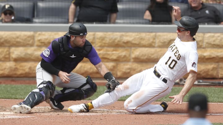 May 10, 2023; Pittsburgh, Pennsylvania, USA;  Colorado Rockies catcher Austin Wynns (16) tags