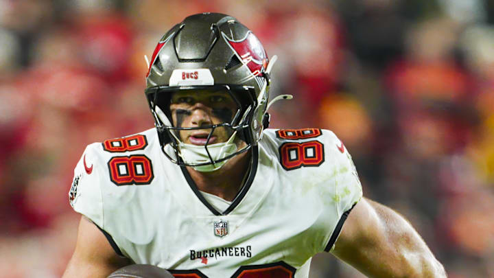 Nov 4, 2024; Kansas City, Missouri, USA; Tampa Bay Buccaneers tight end Cade Otton (88) runs with the ball during the second half against the Kansas City Chiefs at GEHA Field at Arrowhead Stadium. Mandatory Credit: Jay Biggerstaff-Imagn Images