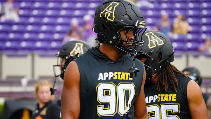 Sep 14, 2024; Greenville, North Carolina, USA;  Appalachian State Mountaineers linebacker Nate Johnson (90) looks on before the game during the warmups against the East Carolina Pirates at Dowdy-Ficklen Stadium. Mandatory Credit: James Guillory-Imagn Images