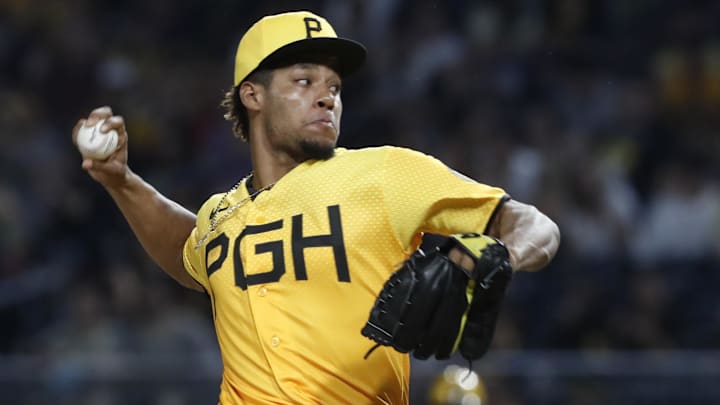 Jun 30, 2023; Pittsburgh, Pennsylvania, USA; Pittsburgh Pirates relief pitcher Dauri Moreta (36) pitches against the Milwaukee Brewers during the seventh inning at PNC Park. Mandatory Credit: Charles LeClaire-Imagn Images