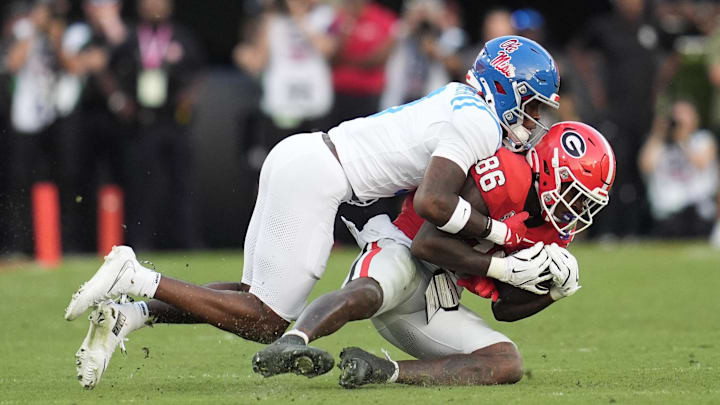 Oct 18, 2025; Athens, Georgia, USA; Georgia Bulldogs wide receiver Dillon Bell (86) makes a catch against Mississippi Rebels cornerback Ricky Fletcher (9) during the fourth quarter of the game at Sanford Stadium. Mandatory Credit: Dale Zanine-Imagn Images Oct 18, 2025; Athens, Georgia, USA; Georgia Bulldogs wide receiver Dillon Bell (86) makes a catch against Mississippi Rebels cornerback Ricky Fletcher (9) during the fourth quarter of the game at Sanford Stadium. Mandatory Credit: Dale Zanine-Imagn Images