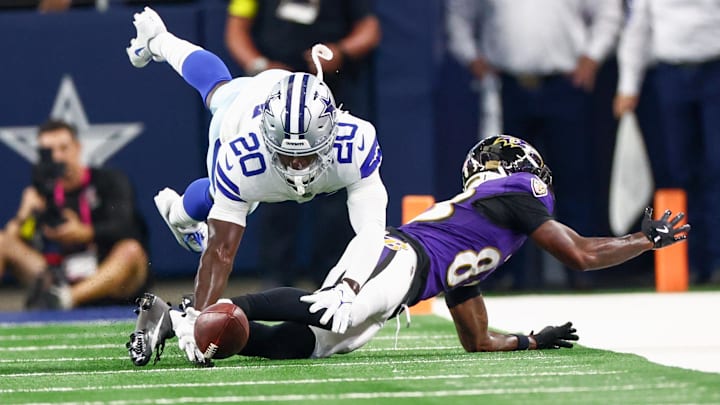 Baltimore Ravens wide receiver LaJohntay Wester and Dallas Cowboys cornerback Kaiir Elam go for the ball. Baltimore Ravens wide receiver LaJohntay Wester and Dallas Cowboys cornerback Kaiir Elam go for the ball.