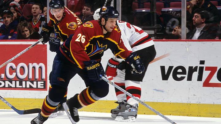 Atlanta Thrashers center Pascal Rheaume (26) against New Jersey Devils center Scott Gomez (23): Lou Capozzola-USA TODAY NETWORK