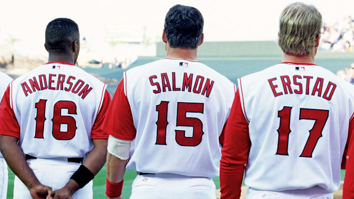 March 31, 2002; Anaheim, CA, USA; FILE PHOTO; Anaheim Angels rightfielder Tim Salmon (15) stands with team members for national anthem sang by Lou Rawls during 2002 pregame season opener against the Cleveland Indians at Edison Field. Mandatory Credit: VJ Lovero-USA TODAY NETWORK