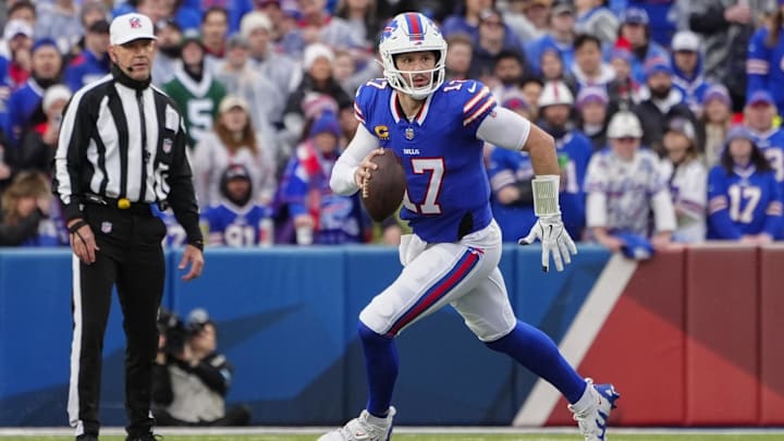 Dec 29, 2024; Orchard Park, New York, USA; Buffalo Bills quarterback Josh Allen (17) rolls out looking to throw the ball.