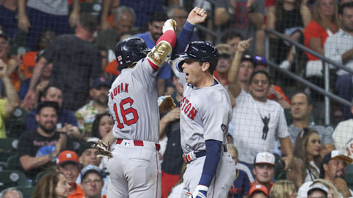 Aug 20, 2024; Houston, Texas, USA; Boston Red Sox center fielder Jarren Duran (16) celebrates with first baseman Triston Casas (36) after hitting a home run during the eighth inning against the Houston Astros at Minute Maid Park. Mandatory Credit: Troy Taormina-Imagn Images