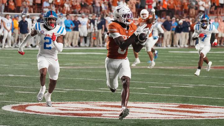 Oct 24, 2026; Austin, Texas, USA; Texas Longhorns wide receiver Cam Coleman (8) attempts to catch the ball in front of Mississippi Rebels cornerback Jaylon Braxton (2) during the first half at Darrell K Royal-Texas Memorial Stadium. Mandatory Credit: Scott Wachter-Imagn Images Oct 24, 2026; Austin, Texas, USA; Texas Longhorns wide receiver Cam Coleman (8) attempts to catch the ball in front of Mississippi Rebels cornerback Jaylon Braxton (2) during the first half at Darrell K Royal-Texas Memorial Stadium. Mandatory Credit: Scott Wachter-Imagn Images