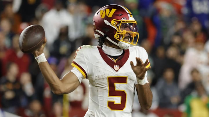 Washington Commanders quarterback Jayden Daniels (5) passes the ball during the second half against the Seattle Seahawks at Northwest Stadium. Washington Commanders quarterback Jayden Daniels (5) passes the ball during the second half against the Seattle Seahawks at Northwest Stadium.