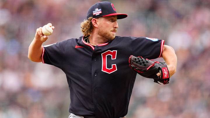 Aug 22, 2026: Cleveland Guardians starting pitcher Tanner Bibee (28) prepares to field the ball to first in the first inning against the Colorado Rockies at Coors Field. Credit: Ron Chenoy-Imagn Images