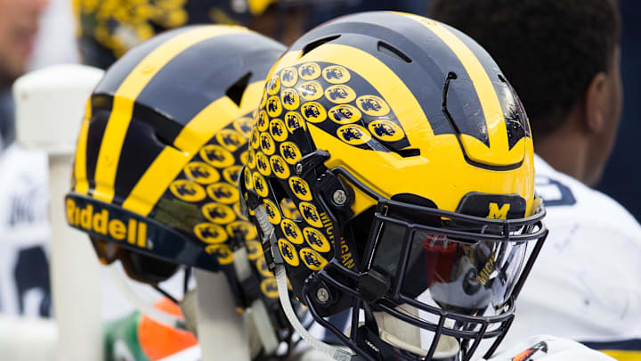 A general view of Michigan Wolverines helmets on the sideline during the game against the Ohio State Buckeyes at Ohio Stadium. Ohio State won the game 30-27 in double overtime. A general view of Michigan Wolverines helmets on the sideline during the game against the Ohio State Buckeyes at Ohio Stadium. Ohio State won the game 30-27 in double overtime.