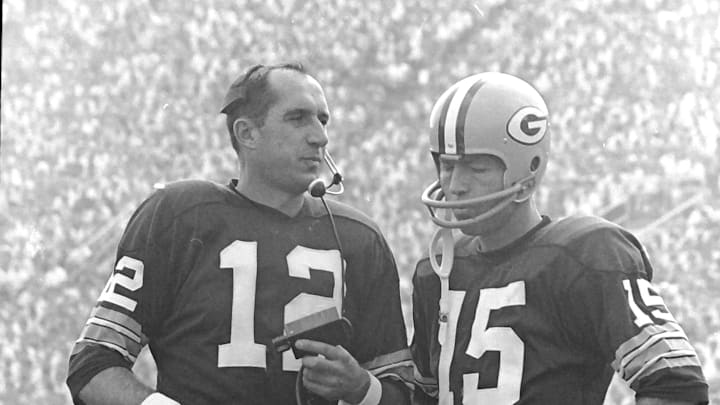 Green Bay Packers quarterbacks Zeke Bratkowski (12) and Bart Starr (15) during a game with the Detroit Lions on Sept. 17, 1967, at Lambeau Field in Green Bay, Wis. The game ended in a 17-17 tie.

Gpg Packers Archive Series 11072022 0033