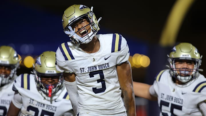 St. John Bosco (Calif.) receiver Daniel Odom shows emotion while taking the field with his teammates before facing Chaminade-Madonna in the season opener in Florida. 